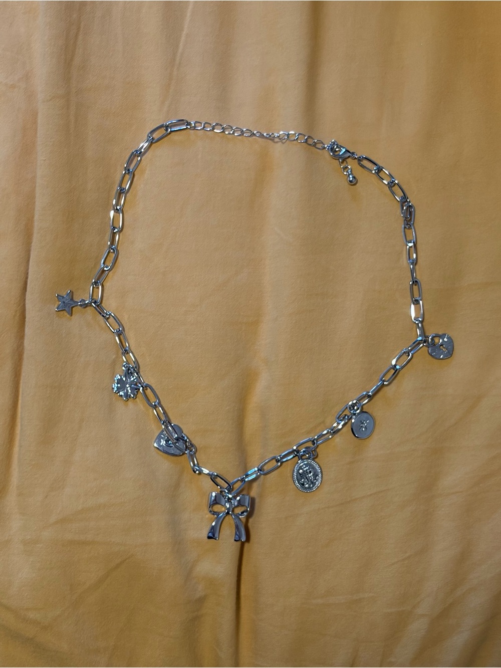 Silver Charm Chain Necklace with Bow and Medallion